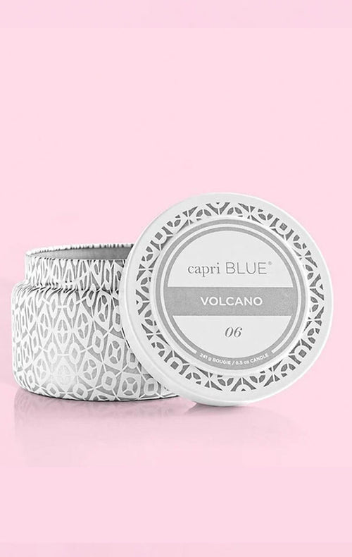 Capri Blue Volcano Signature White Printed Mini Travel Tin Candle-Hand In Pocket